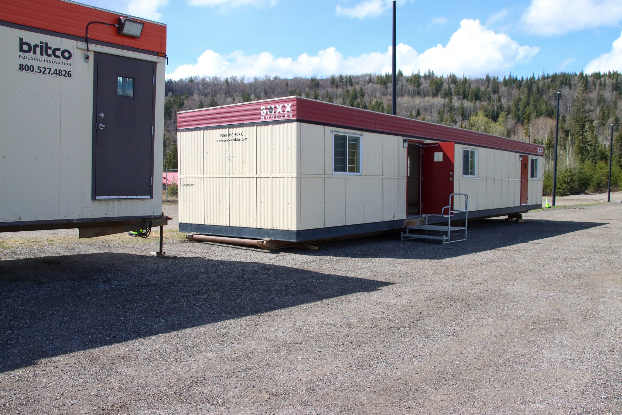 a photo showing two atco trailers side by side