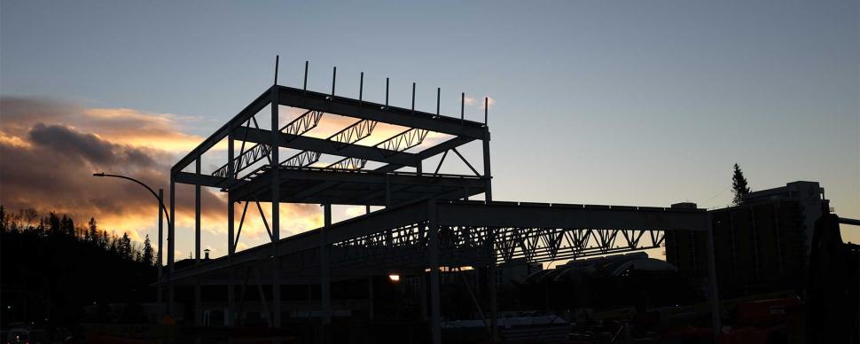 Silhouette photo of the Canfor Leisure Pool under construction.