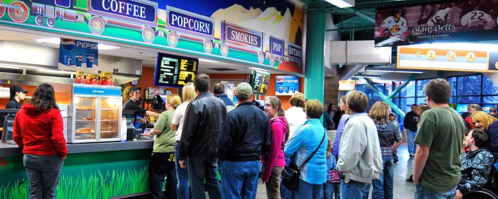 Customers waiting in line for food at one of the CN Centre's concession stands.