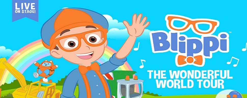 Blippi and his special guest Meekah waving with a garbage truck and excavator in a field with a rainbow overhead. Blippi The Wonderful World Tour logo in Bold Blue, Orange and White text.