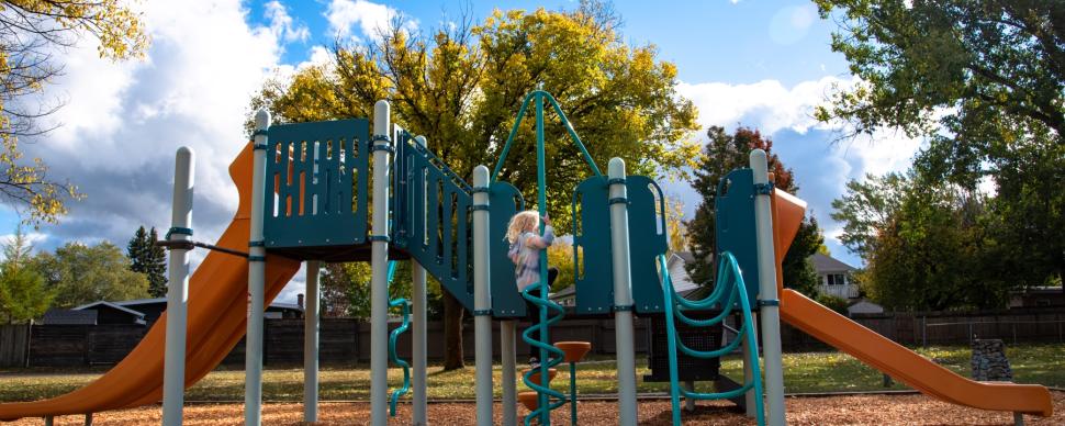 Child playing on Seymour Park playground
