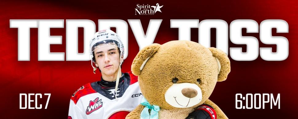 Spirit of the North Teddy Toss December 7 6:00PM Photo of Cougars Player holding a giant teddy bear.