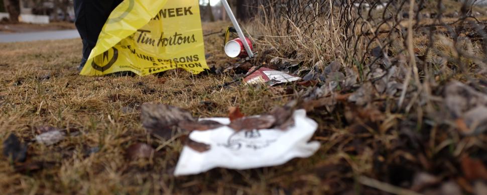 Person picking up litter 