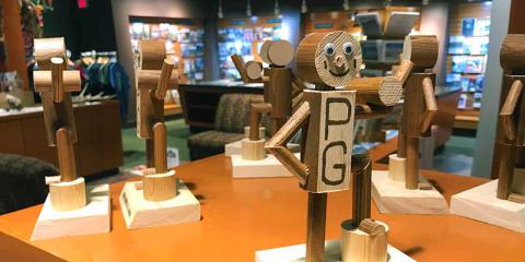Wooden Mr. PG figurines at Tourism Prince George.
